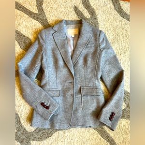 Riding jacket with elbow patches